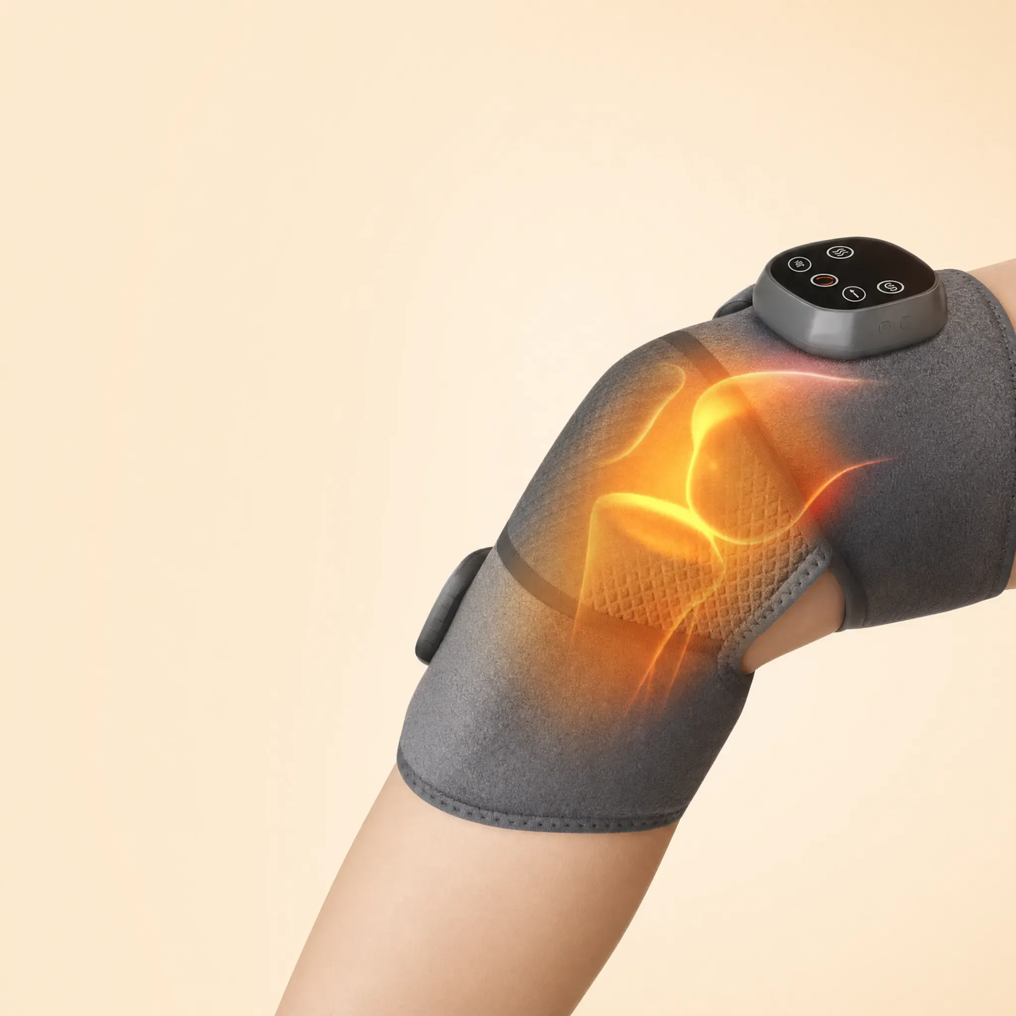 The ReliefMD Knee Massager worn while seated, a subtle warmth glow building around the knee